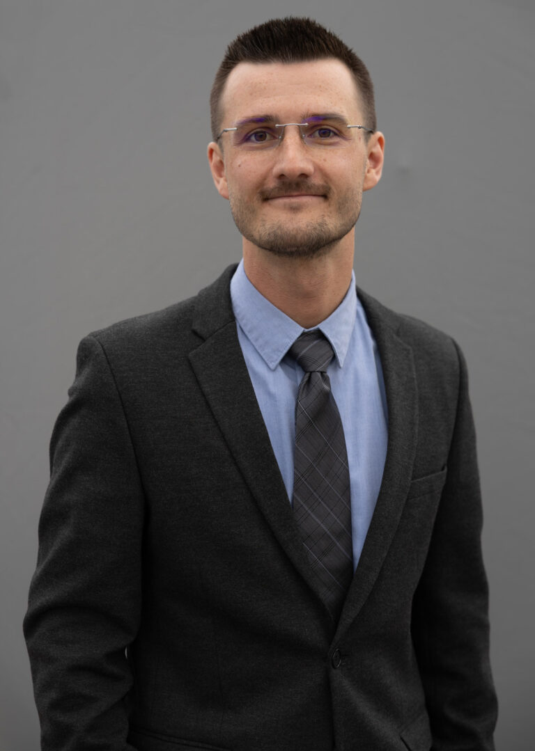 Professional business headshot with grey background in Okanagan, BC.