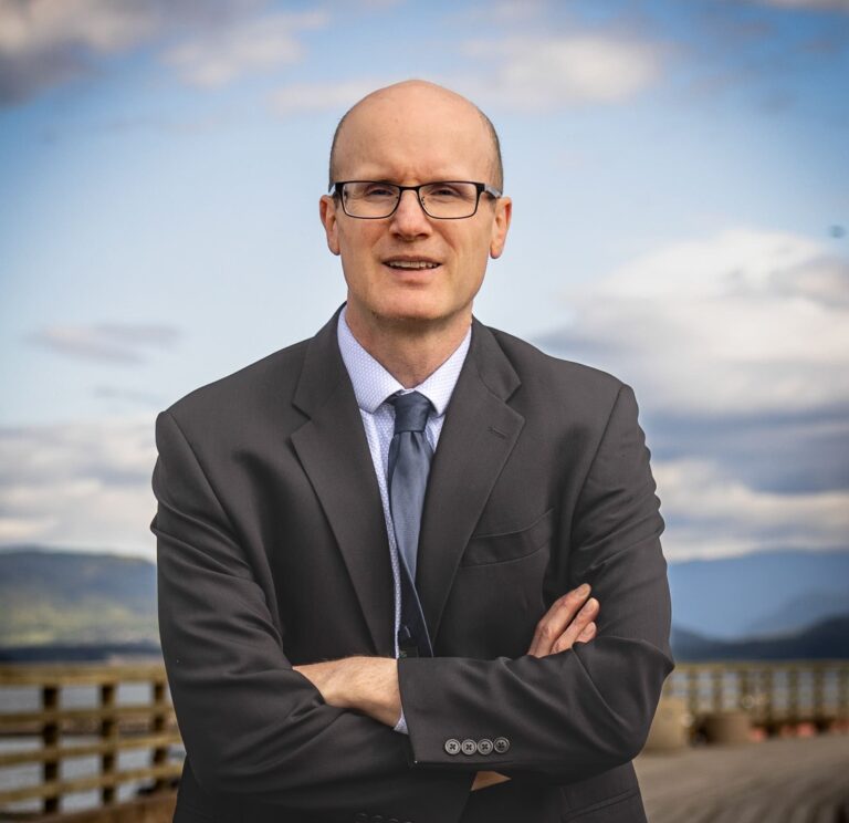 Outdoor business portrait in Okanagan, BC – professional headshot in suit.