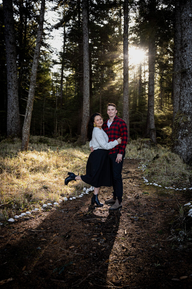 Couples portrait photography in Okanagan BC – romantic sunlit forest session.