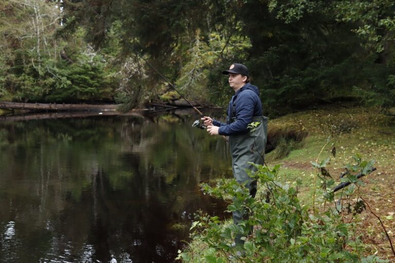 Professional sports photographer in BC – outdoor fishing action photo.